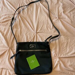 Kate Spade. Black purse. Like new conditions